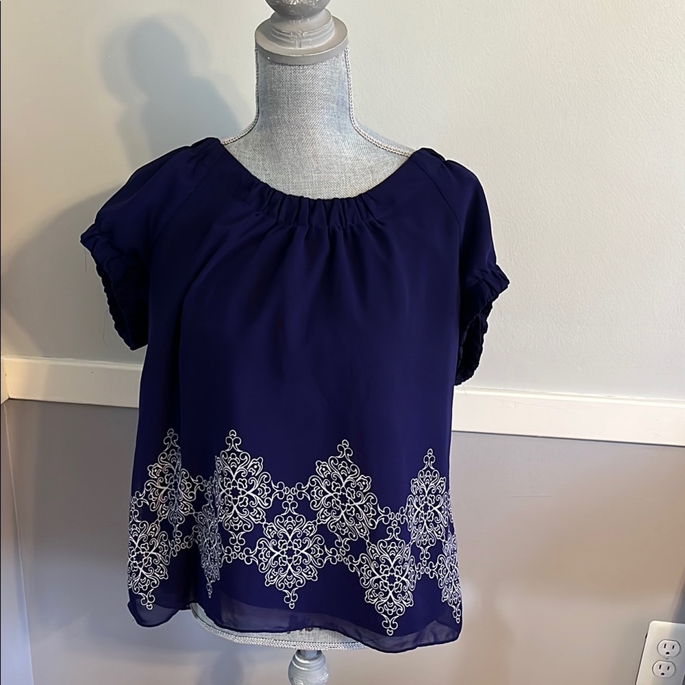 Elegant Purple Women's Top with White Design